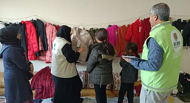 Umut Kervanı Vakfı Ceylanpınar'da giyim ve gıda yardımı 
